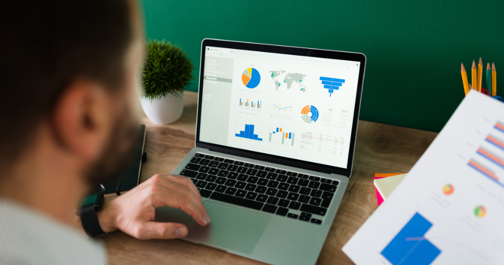 A marketer analyzing Google Ads Service metrics on a laptop to track campaign success and drive targeted traffic for business growth.